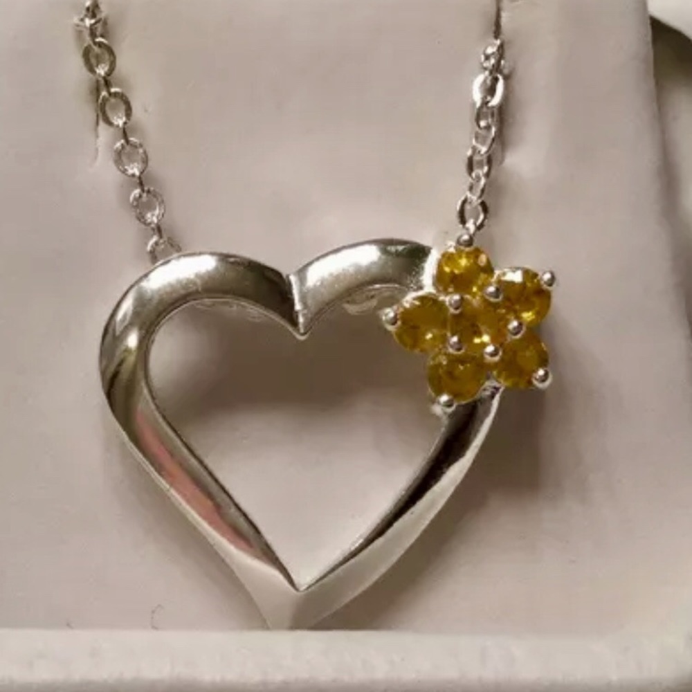 Sterling silver necklace 18.5” and yellow stone